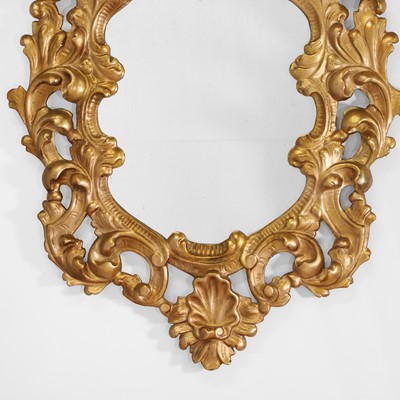 Lot 206 - A gilt composition oval mirror