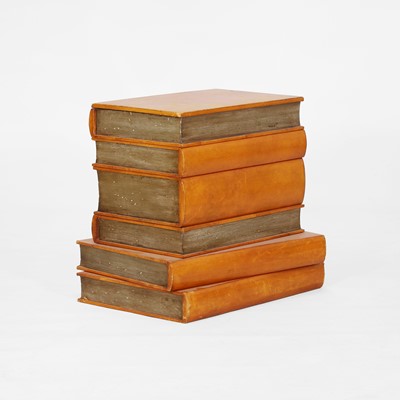 Lot 260 - An occasional table in the form of a stack of books