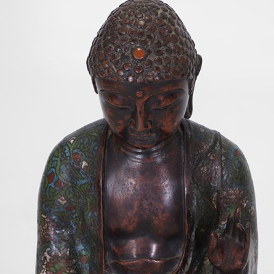 Lot 214 - A bronze and cloisonné enamel Buddha