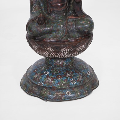 Lot 214 - A bronze and cloisonné enamel Buddha
