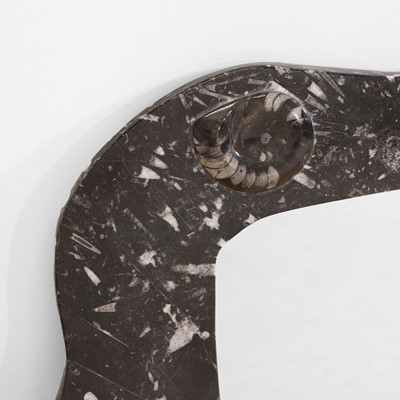 Lot 150 - A fossil marble mirror