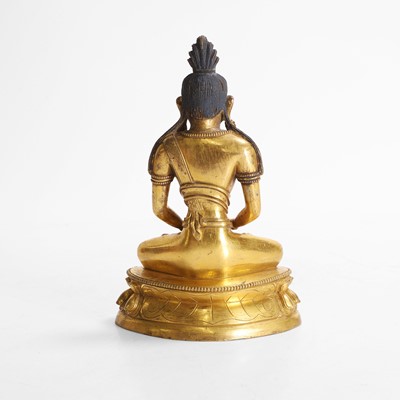 Lot 340 - A Chinese gilt-bronze Buddha