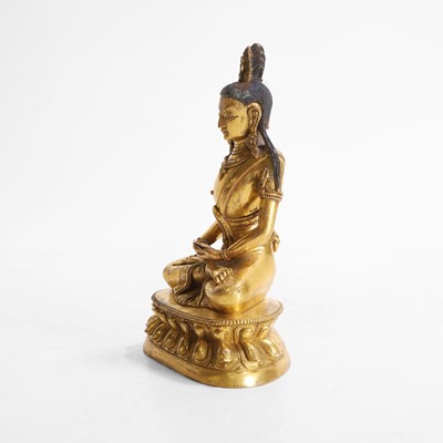 Lot 340 - A Chinese gilt-bronze Buddha