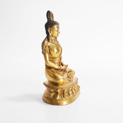 Lot 340 - A Chinese gilt-bronze Buddha