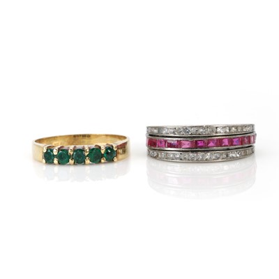 Lot 183 - An emerald five stone ring and a night and day ring