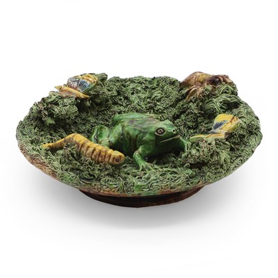 Lot 311 - A majolica Palissy type pottery dish