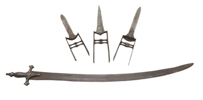 Lot 126 - A group of three Katar daggers