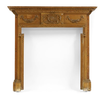 Lot 583 - A George II-style carved pine chimneypiece