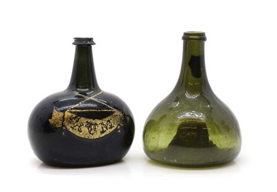Lot 366 - An olive green glass decanter