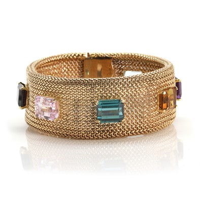 Lot 241 - A gold and multi-gem strap bracelet