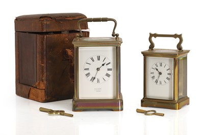 Lot 201 - A brass carriage clock, in a travelling case, and another