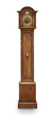 Lot 509 - A Westminster chiming grandmother clock