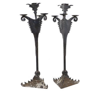 Lot 548 - A pair of large pricket stands