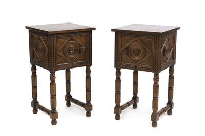 Lot 610 - A pair of carved walnut bedside tables