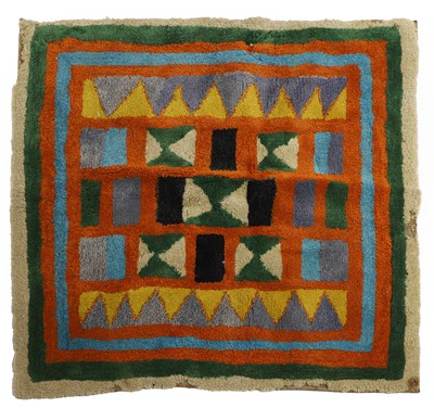 Lot 526 - A polychrome wool rug