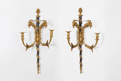 Lot 392 - A pair of Louis XVI-style gilt-bronze and blue steel wall lights