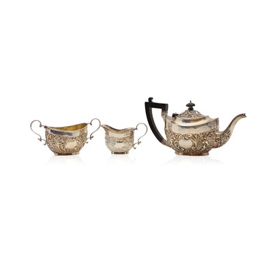 Lot 77 - A silver three piece tea service