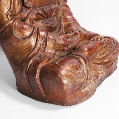 Lot 215 - A gilt-lacquer wood and composition figure of seated Buddha