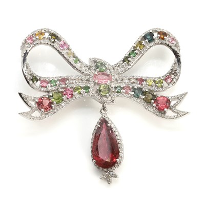 Lot 178 - A silver diamond, and gemstone set bow pendant/brooch