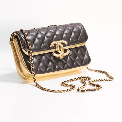 Lot 467 - A Chanel black and gold foiled leather double-flap bag