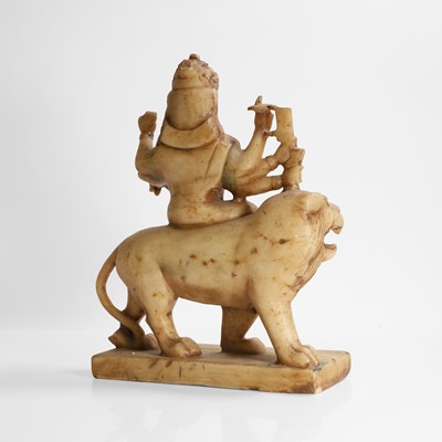 Lot 142 - An alabaster carved figure of Durga