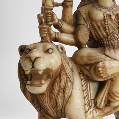 Lot 142 - An alabaster carved figure of Durga