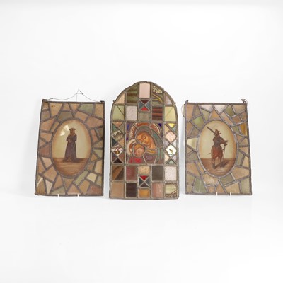 Lot 503 - A pair of figural stained-glass panels