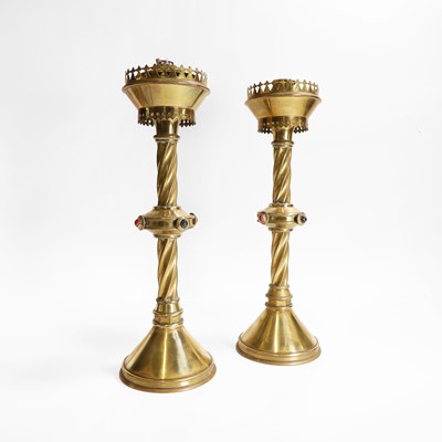 Lot 532 - A pair of Gothic Revival brass altar candlesticks