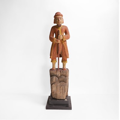 Lot 8 - A carved and polychrome-painted figure