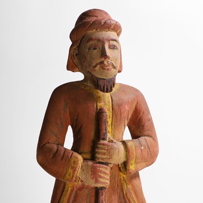 Lot 8 - A carved and polychrome-painted figure