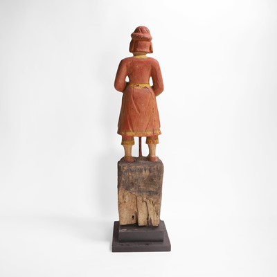 Lot 8 - A carved and polychrome-painted figure