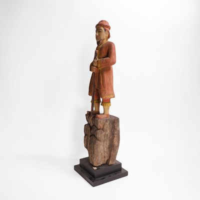 Lot 8 - A carved and polychrome-painted figure