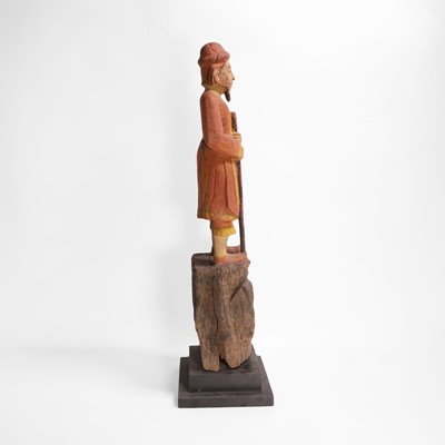 Lot 8 - A carved and polychrome-painted figure