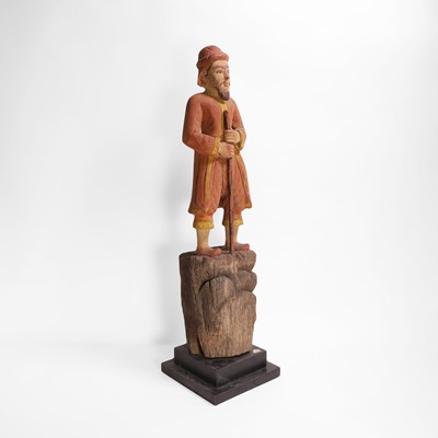 Lot 8 - A carved and polychrome-painted figure