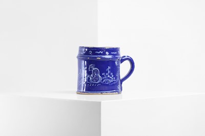 Lot 4 - An English delft chinoiserie mug