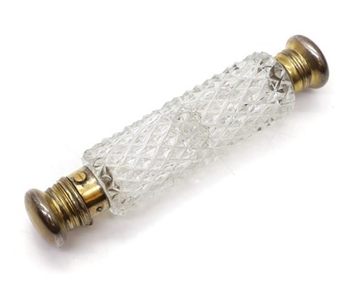 Lot 69 - A Victorian gilt and cut glass double-end scent bottle