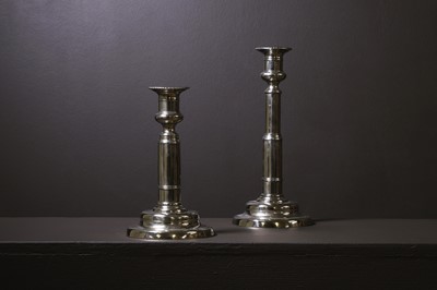 Lot 306 - A pair of George III paktong telescopic candlesticks