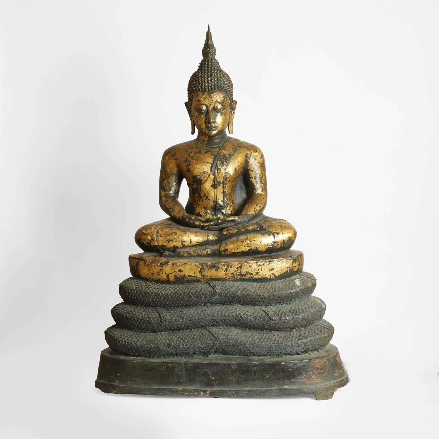 Lot 395 - A large Thai gilt-metal figure of the Buddha