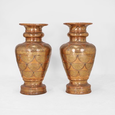 Lot 513 - A monumental pair of polished copper and brass urns