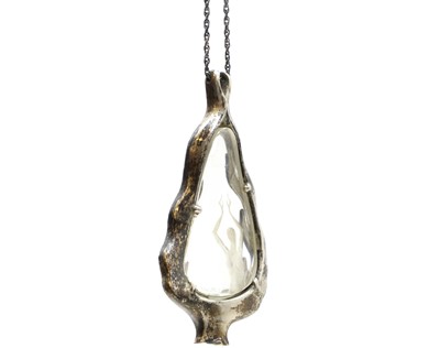 Lot 71 - An etched glass silver pendant