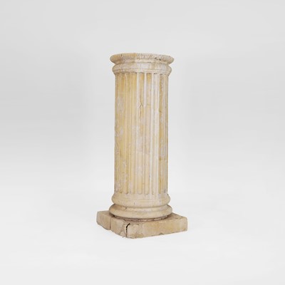 Lot 26 - A composite pedestal