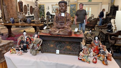 Lot 219 - A painted and lacquered wooden folding altar