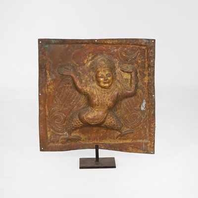 Lot 127 - A gilt-copper repoussé temple plaque
