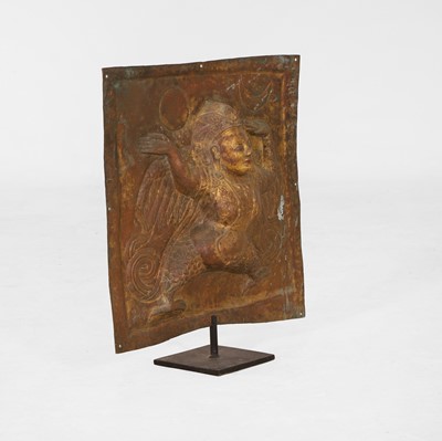 Lot 127 - A gilt-copper repoussé temple plaque