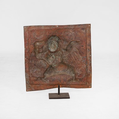 Lot 127 - A gilt-copper repoussé temple plaque