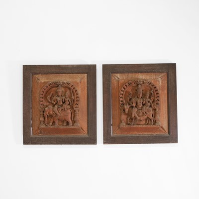 Lot 221 - A pair of carved teak panels