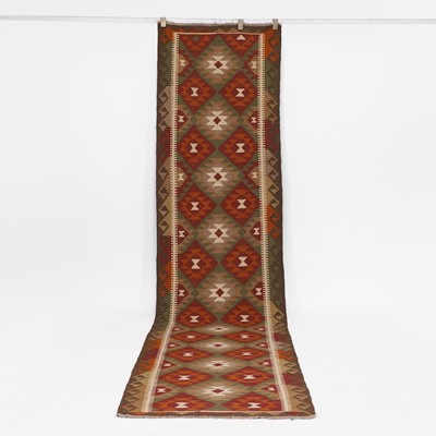Lot 9 - A kilim runner