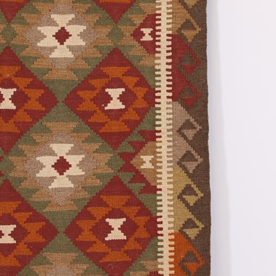Lot 9 - A kilim runner