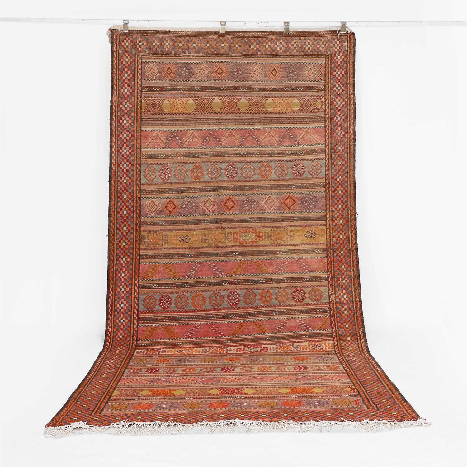 Lot 211 - A large flat-weave wool runner
