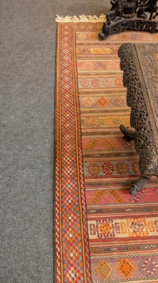 Lot 211 - A large flat-weave wool runner